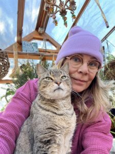 Phebe Phillips with her cat, Ranger from the Manger.
